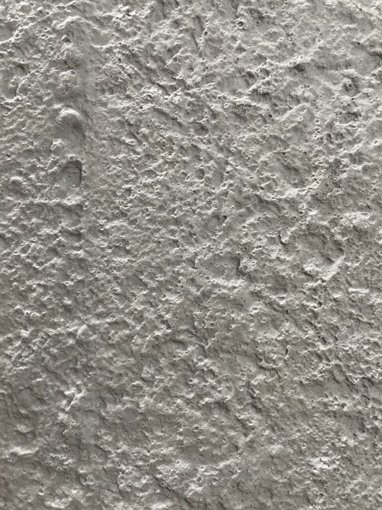 Flexible concrete veneer panel