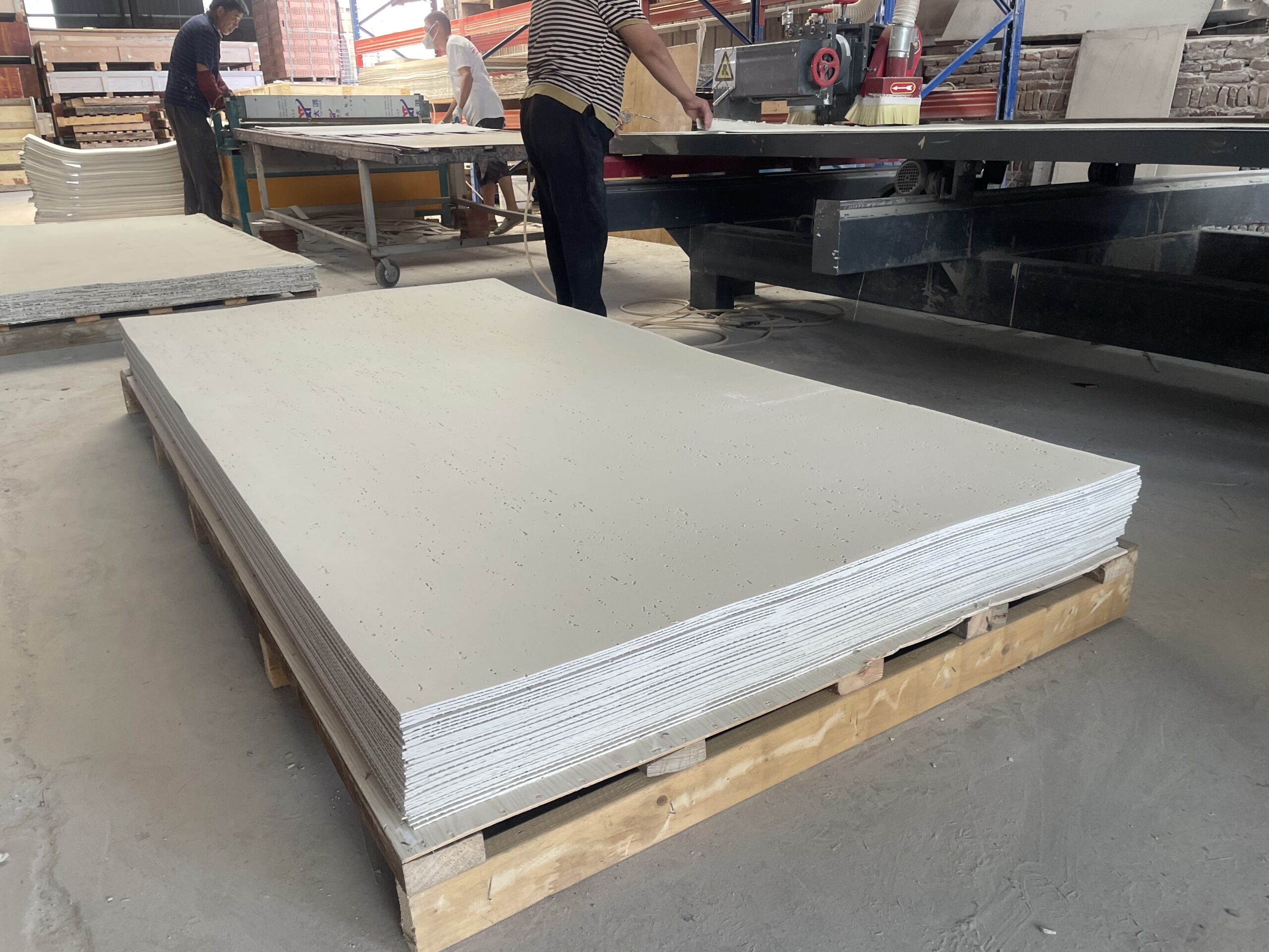 Panel cutting line trimming flexible stone sheets in the factory